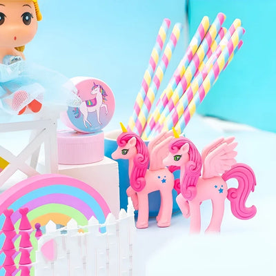 Winged unicorn erasers and striped pencils, styled with props that are not included