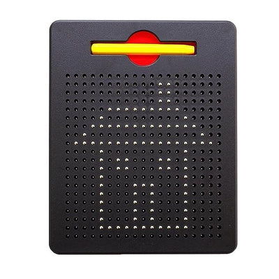Magnetic bead drawing board showing a drawn house
