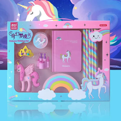 Unicorn Writing Set box front: notebook, striped pencils, unicorn, crown and castle erasers, rainbow piece