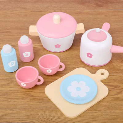 Pastel blue wooden play kitchen with brick backsplash