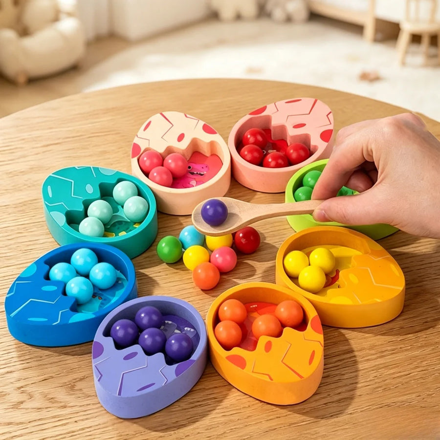 Six colourful dinosaur-egg bowls filled with matching wooden beads