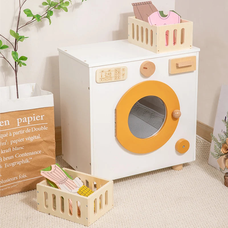 White wooden toy washing machine with laundry baskets