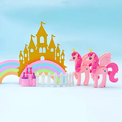 Unicorn and castle erasers in a styled scene; felt castle, fence and extra pieces are props, not included